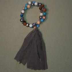 Bracelet perles et pompon